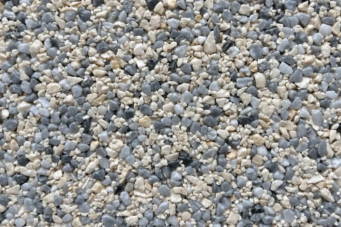 Ipanema Beach resin bound aggregate close-up, light cream and grey blend